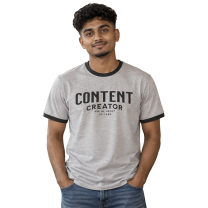 Content Creator Collab Magnet ringer tee in heather grey and black worn by a model on white (AI-generated model image)